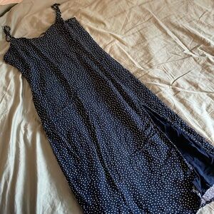 Navy polka dot midi dress with side slit
